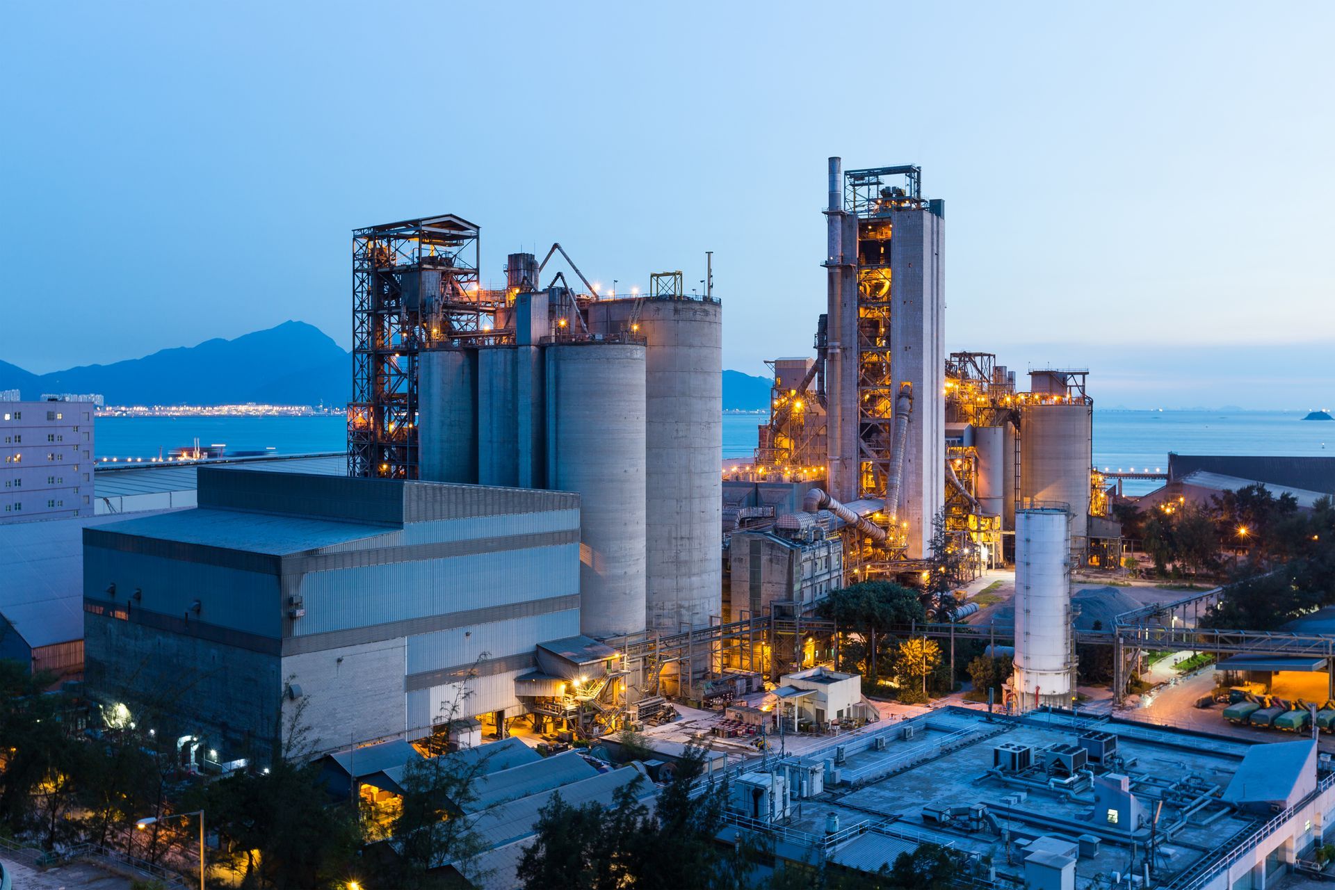 An aerial view of a large industrial plant at night.