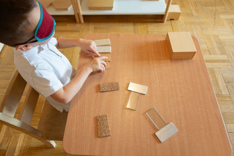 Montessori child sensing blocks