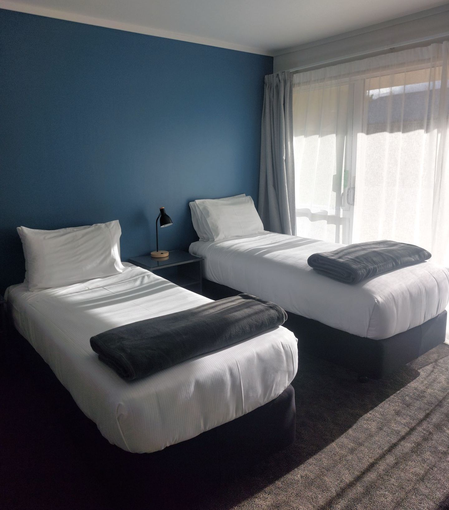 TWIN STUDIO WITH TWO LONG SINGLE BEDS
