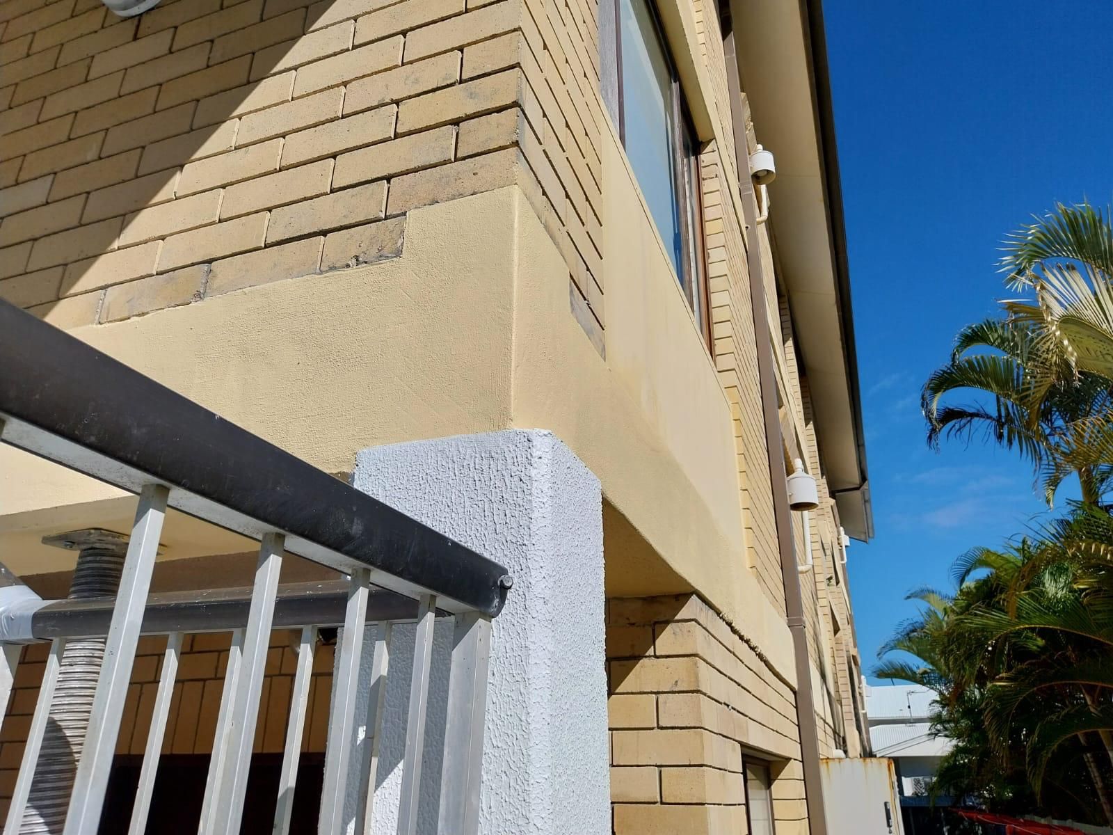 BUILDING CORNER COLUMN & BEAM STRUCTURAL CONCRETE REPAIRS