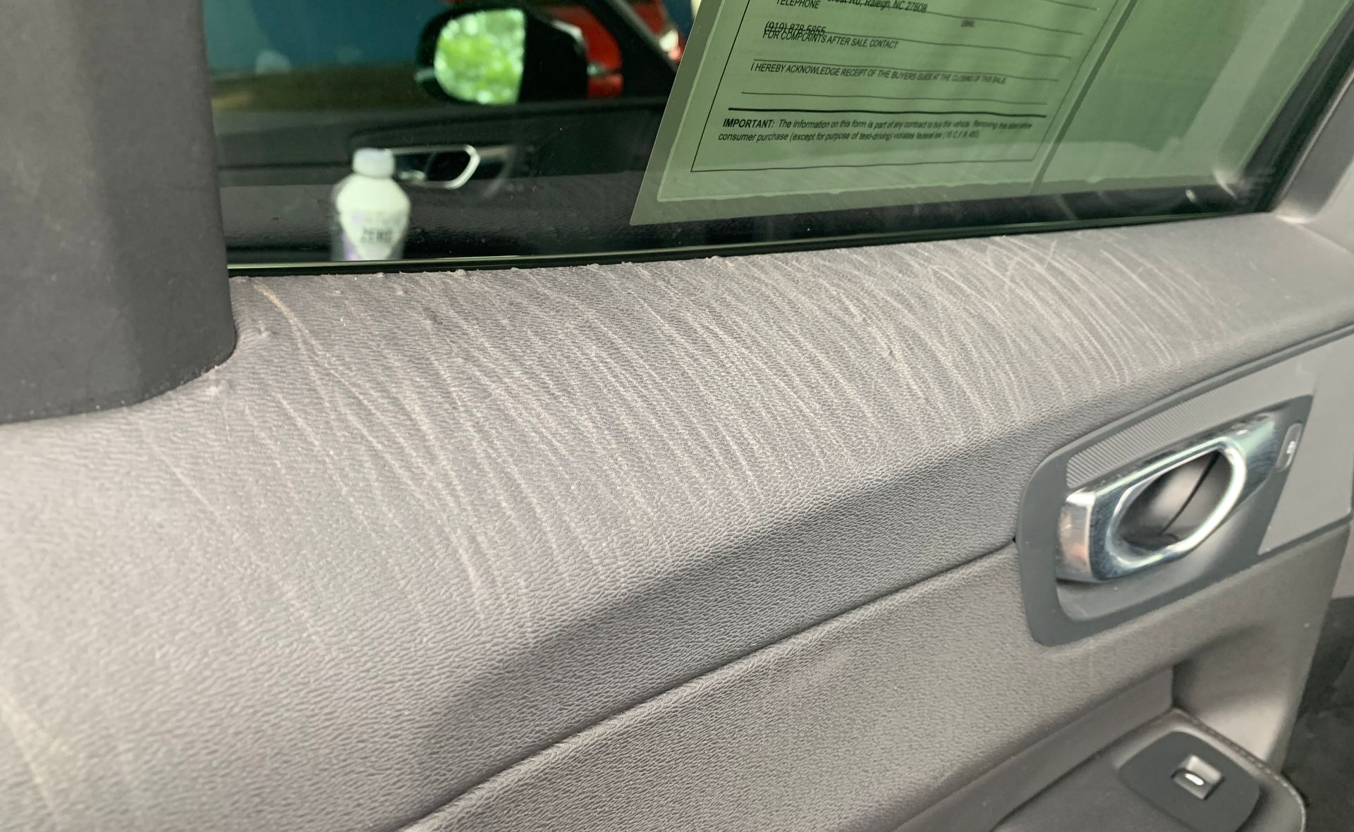 Dog Scratches on Door in Car