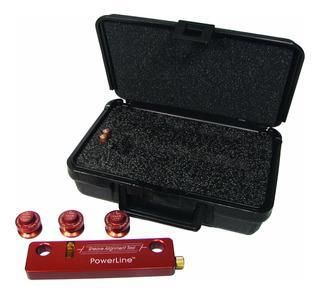 Un kit de herramientas de alineación de orificios PowerLine rojo en un estuche negro abierto con varios accesorios rojos.