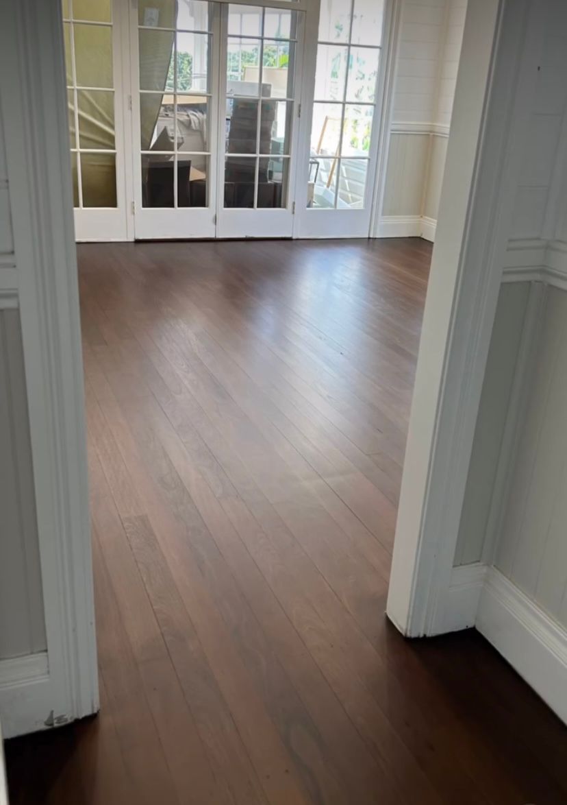 A Door Way With Dark Stained Wooden Floors — Byron Floor Sanding In Bangalow, NSW
