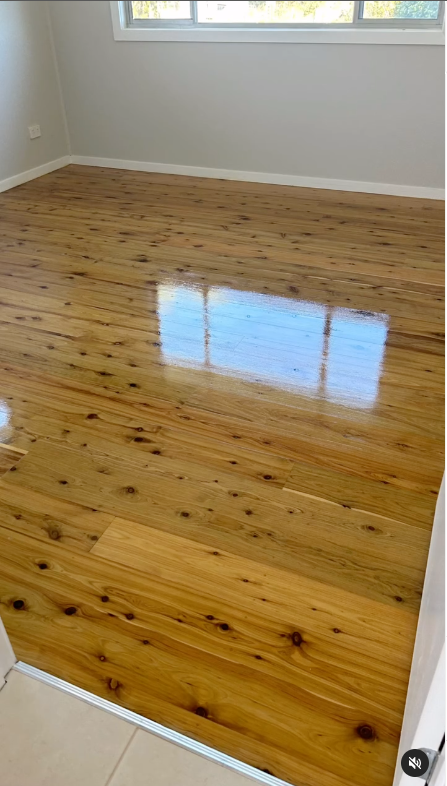 A Close Up Of A Polished Wooden Floor — Byron Floor Sanding In Norther Rivers, NSW