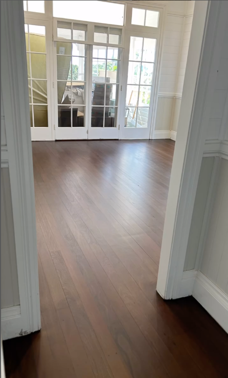 A Door Way With Dark Stained Wooden Floors — Byron Floor Sanding In Tintenbar, NSW