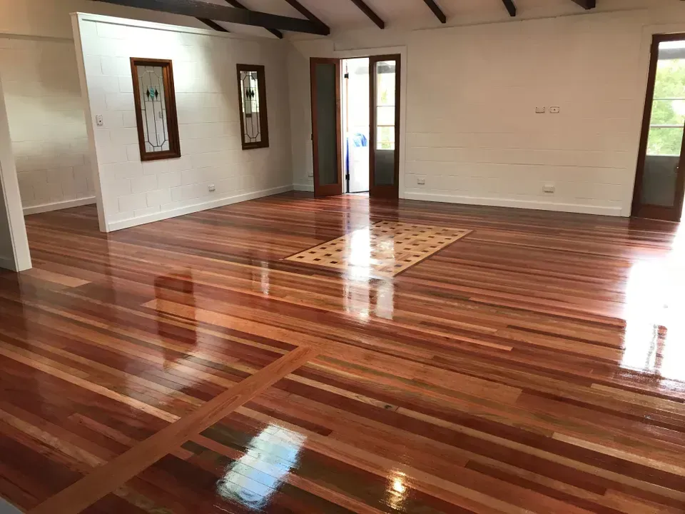 A Room with Two Windows and A Door and Highly Polished Wooden Floor— Byron Floor Sanding In Ballina, NSW