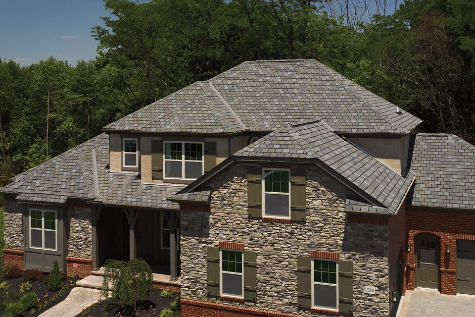 Worker On Application Synthetic Waterproofing — Keene, NH — W.E. Brown Roofing