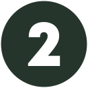 A white number two in a black circle.