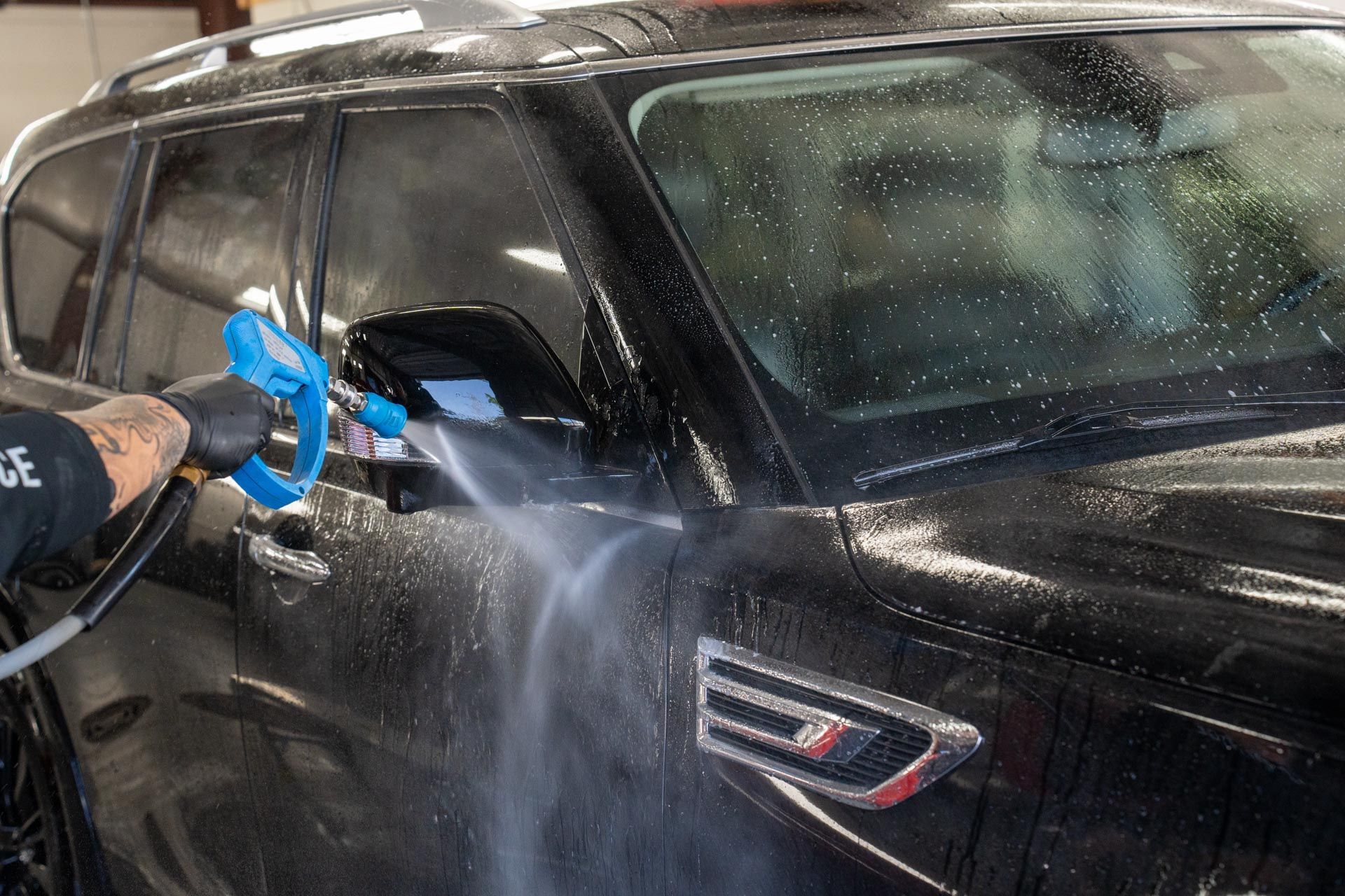 Exterior Detailing - Spraying water on the car in Mansfield, OH