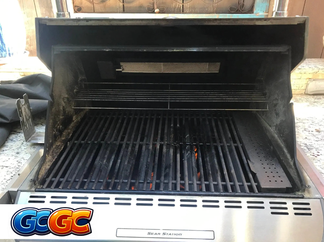 Professional grill cleaners in Foley cleaning a residential gas grill