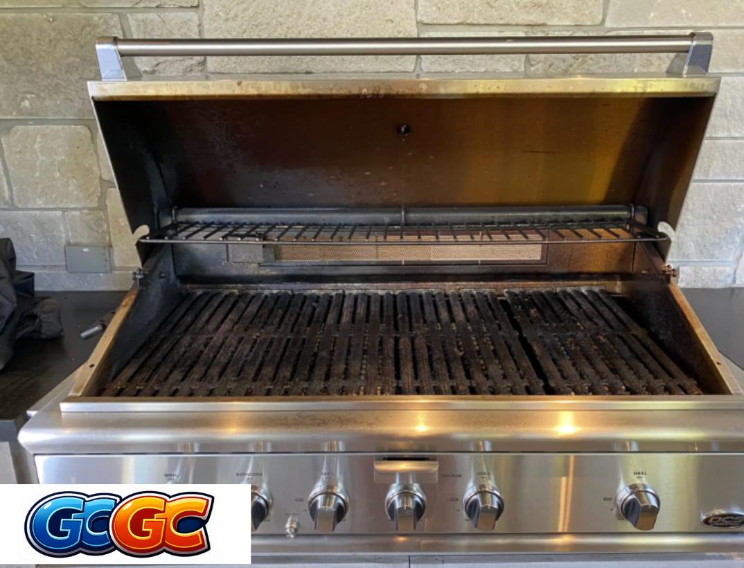 Professional grill cleaners in Foley removing carbon buildup from grills