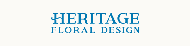 Heritage Floral Design logo in blue text on a white background