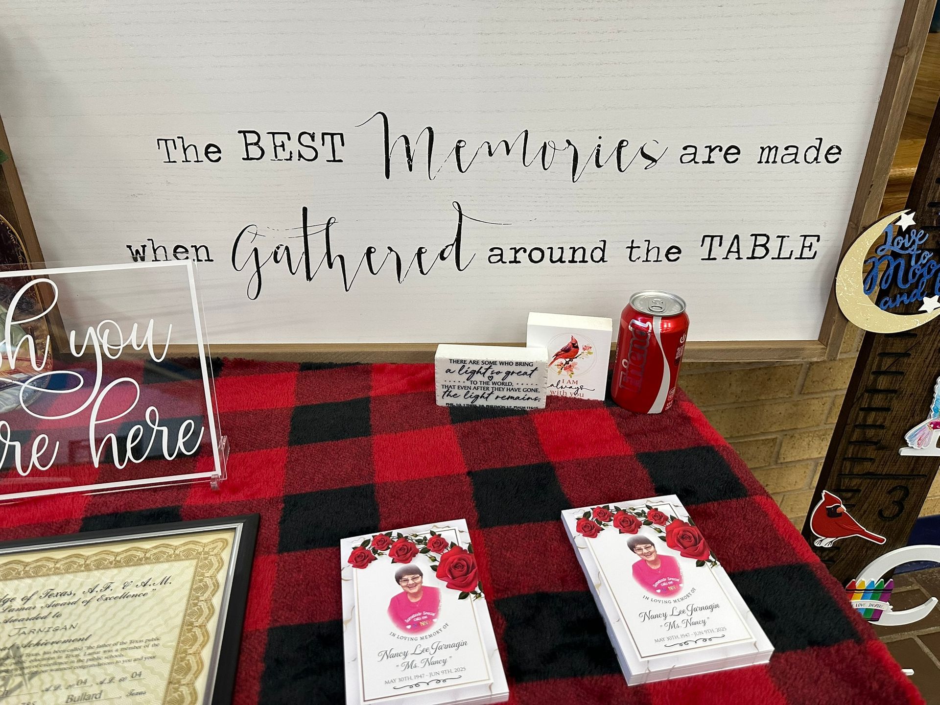Display with memorial books, a sign (