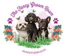 The logo for the fancy groom room shows three dogs sitting in the grass.