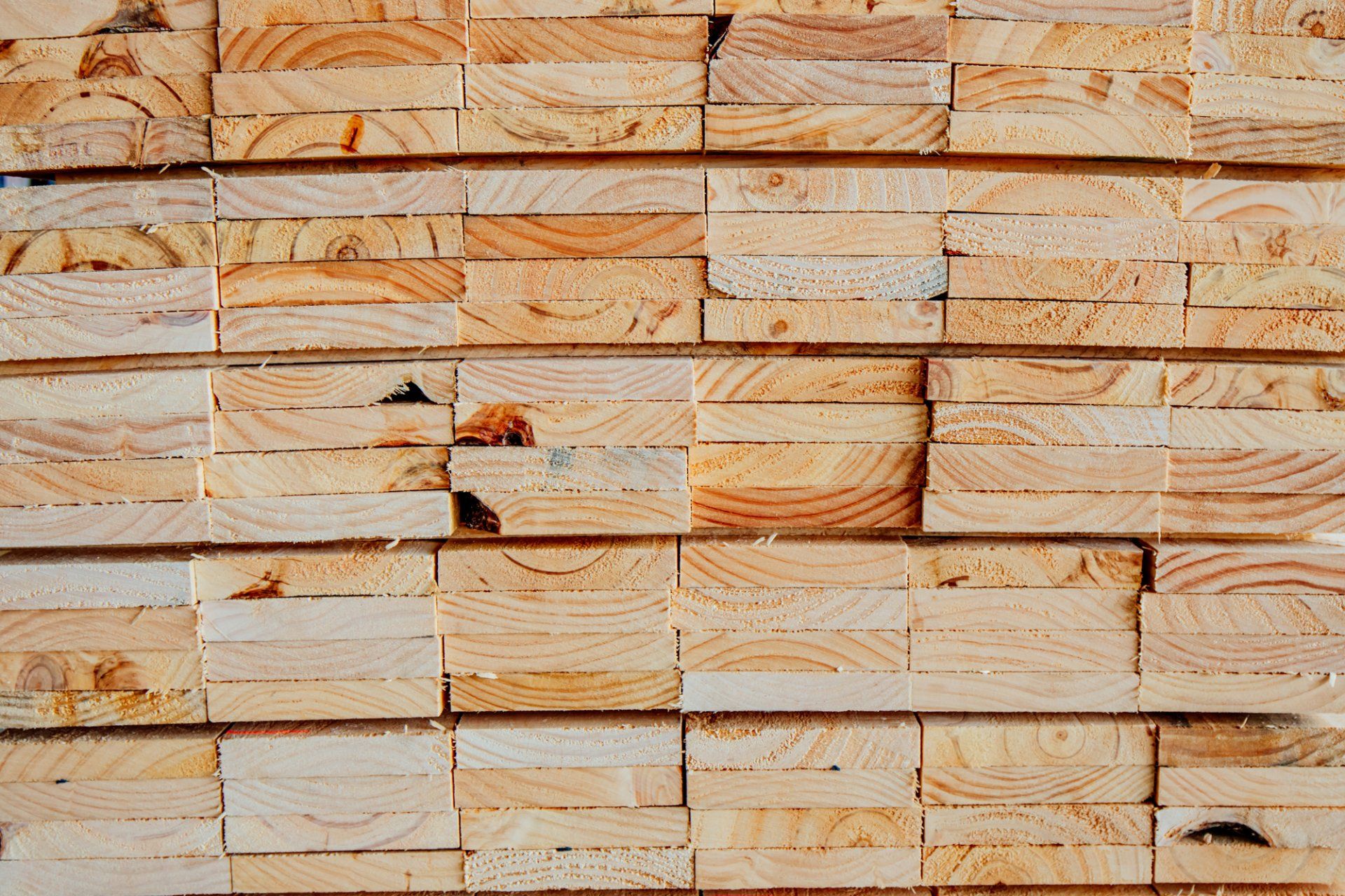 Stacked planks of timber