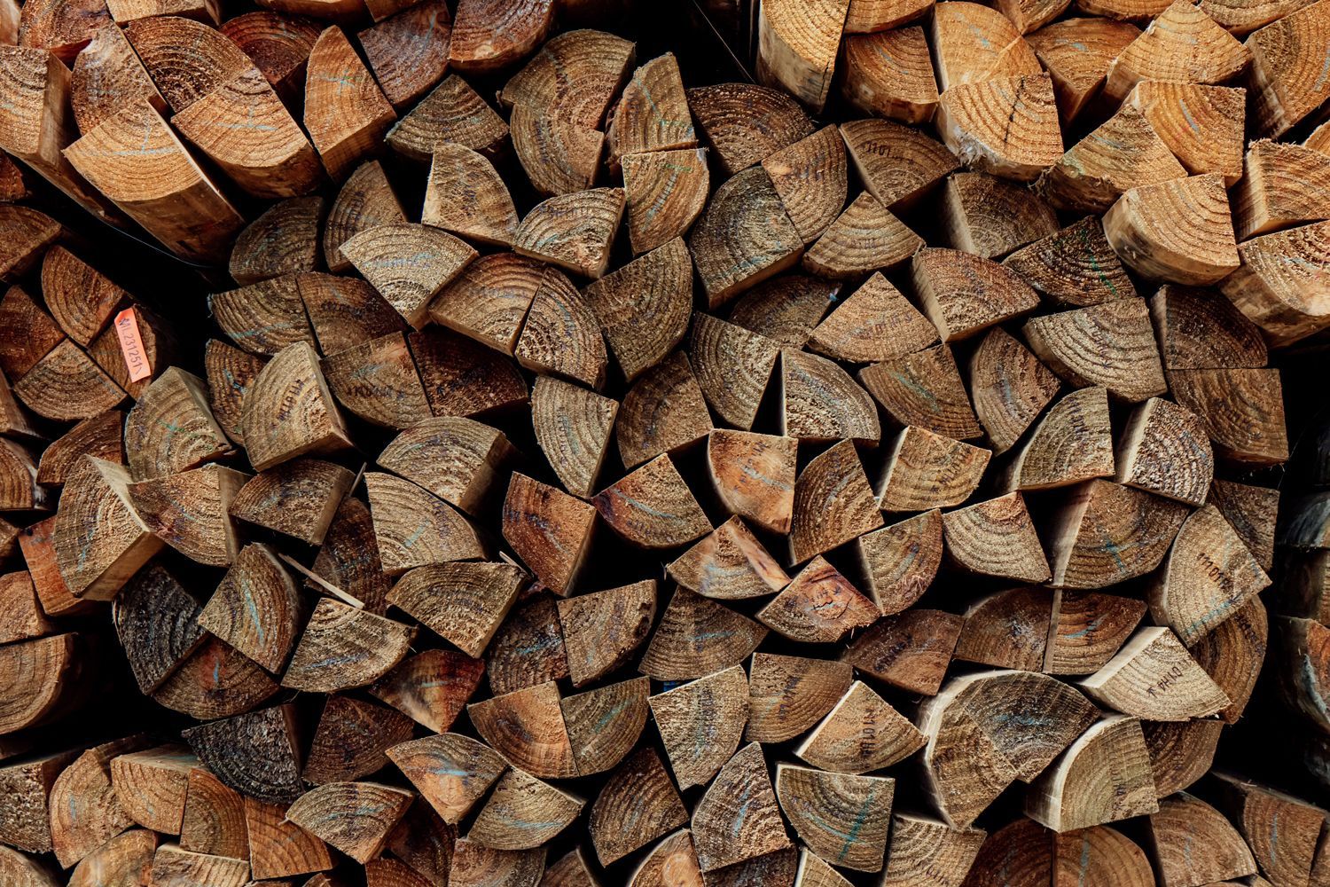 posts cut into quarters stacked.