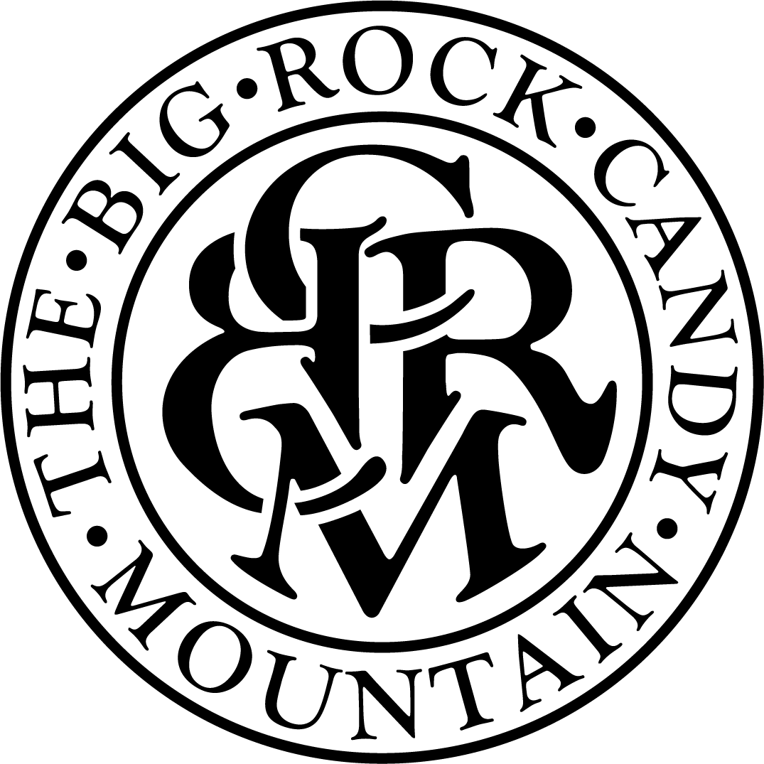 A black and white logo for the big rock mountain candy company.