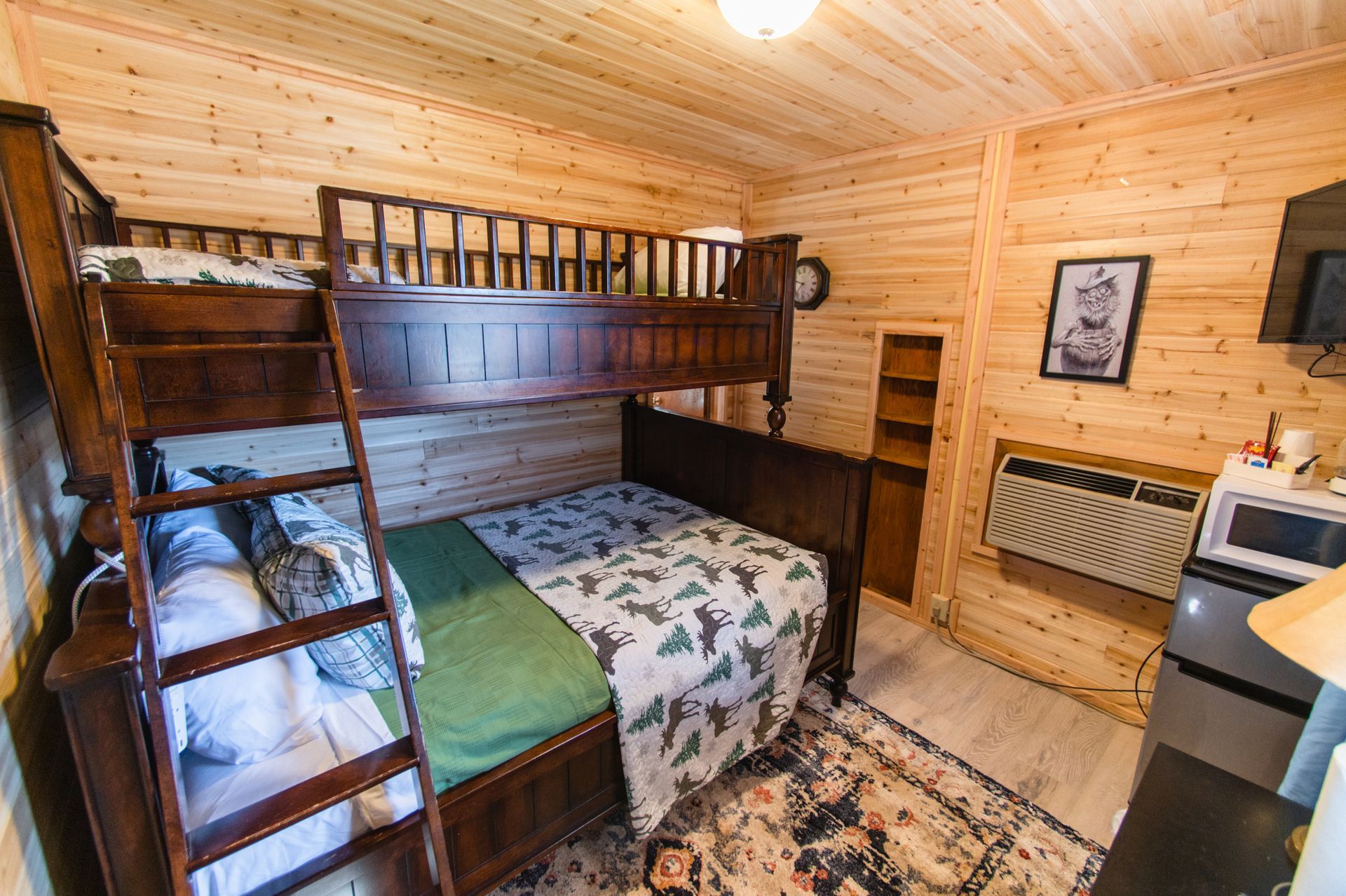 There is a bunk bed in the middle of the room.