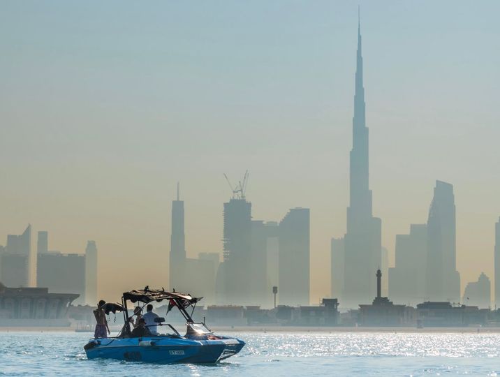 wakesurf boat with skyline