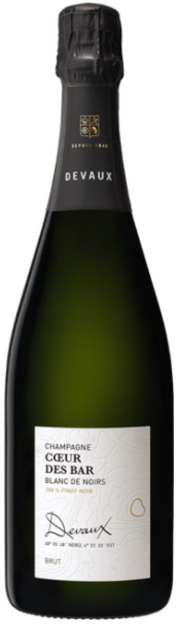 Bottiglia di champagne con tappo nero ed etichetta bianca. Sull'etichetta c'è scritto 