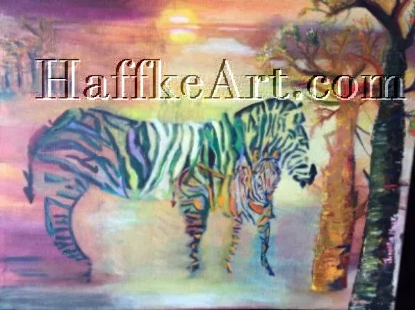 Colorful zebra standing beside a tree at sunset, with