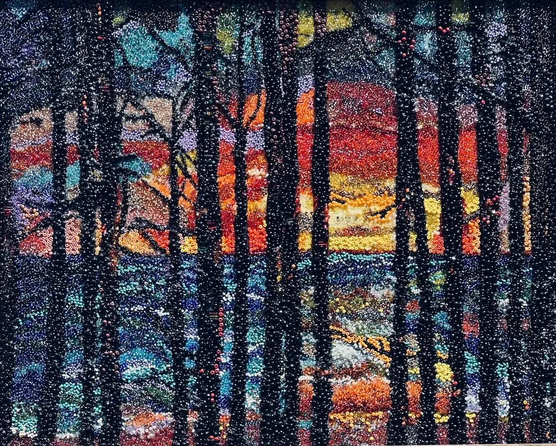 Beaded mixed media landscape painting featuring a vibrant Nevada sunset with textured beadwork 