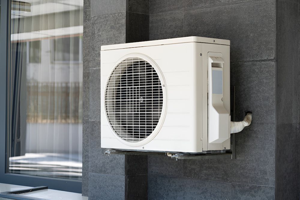 A White Air Conditioner — BT Airconditioning In Portsmith, QLD