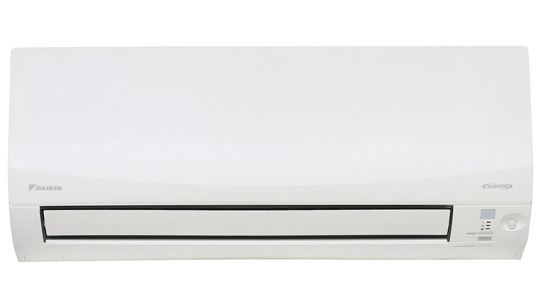 A White Air Conditioner is Sitting on a White Surface — BT Airconditioning In Portsmith, QLD