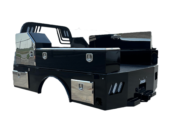 Black truck bed with metal toolboxes and chrome accents.