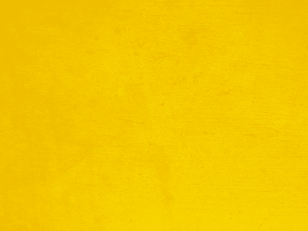A close up of a yellow fabric texture.
