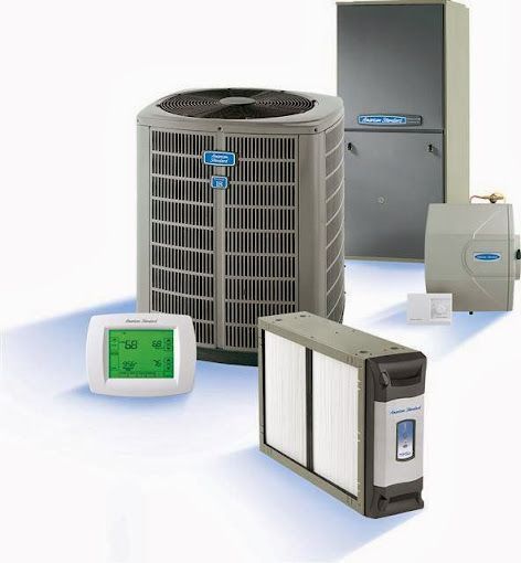 Assorted HVAC units and a digital thermostat on a white background