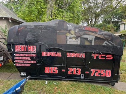 Black dumpster with