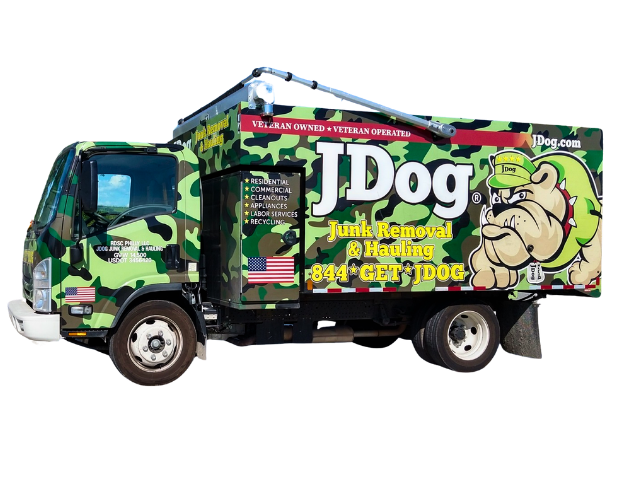 Colorful JDog garbage truck with green camouflage branding and cartoon dog graphics on the side