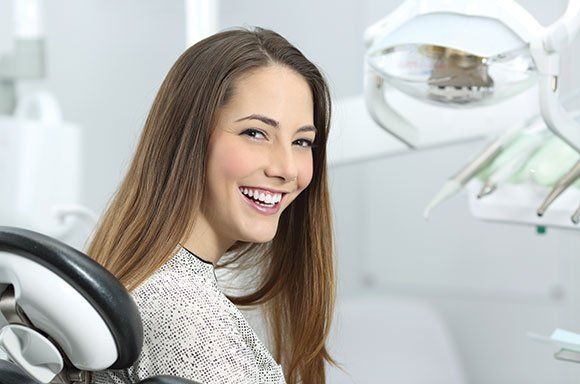 Woman Inside the Dental Office — Palm Bay, FL — Babcock Dental Center LLC Woman Inside the Dental Office — Palm Bay, FL — Babcock Dental Center LLC