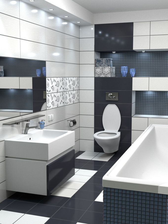Modern bathroom with white and black tiled walls, sink, toilet, and bathtub.