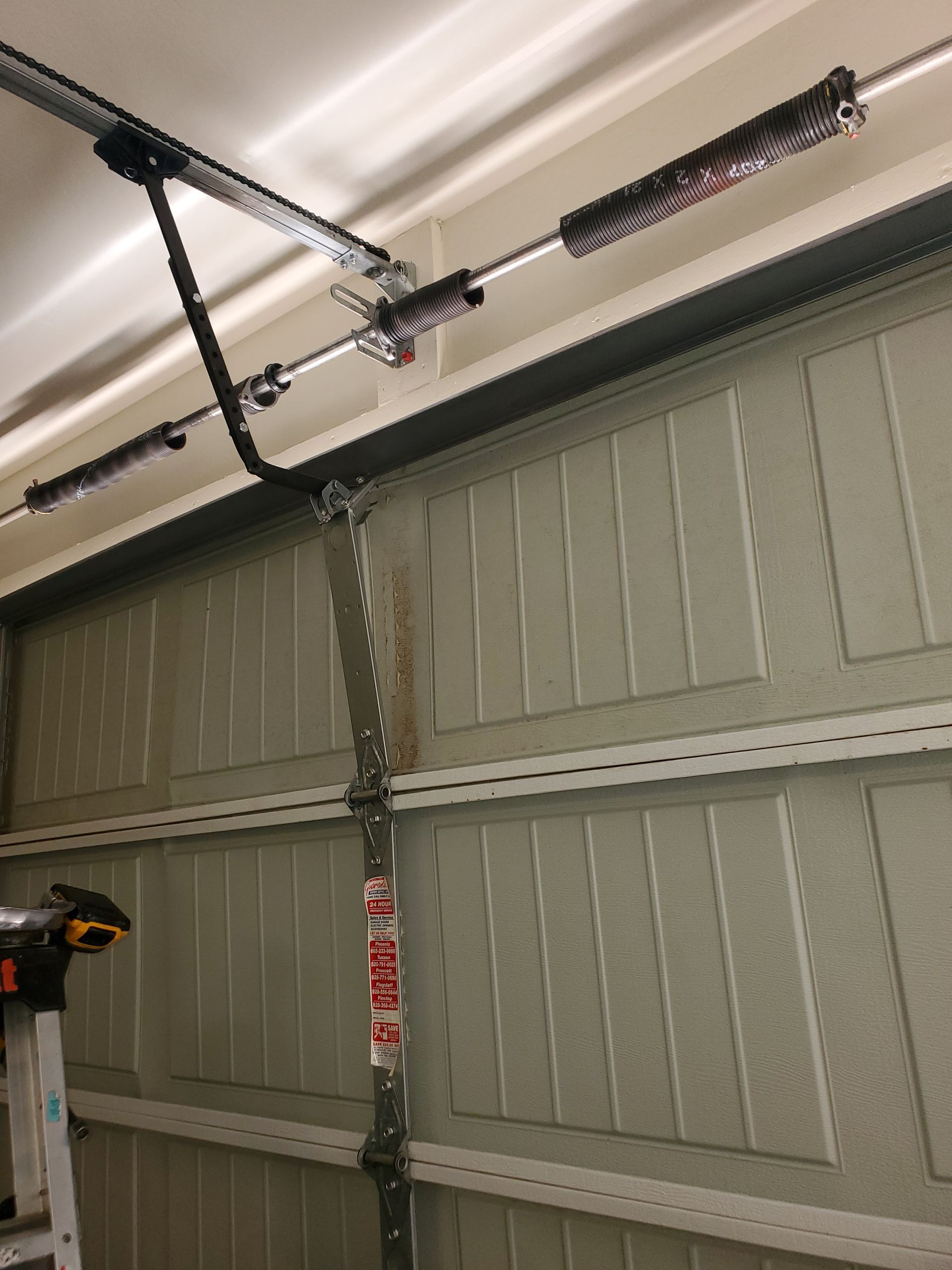 Garage door spring broken in Buckeye AZ