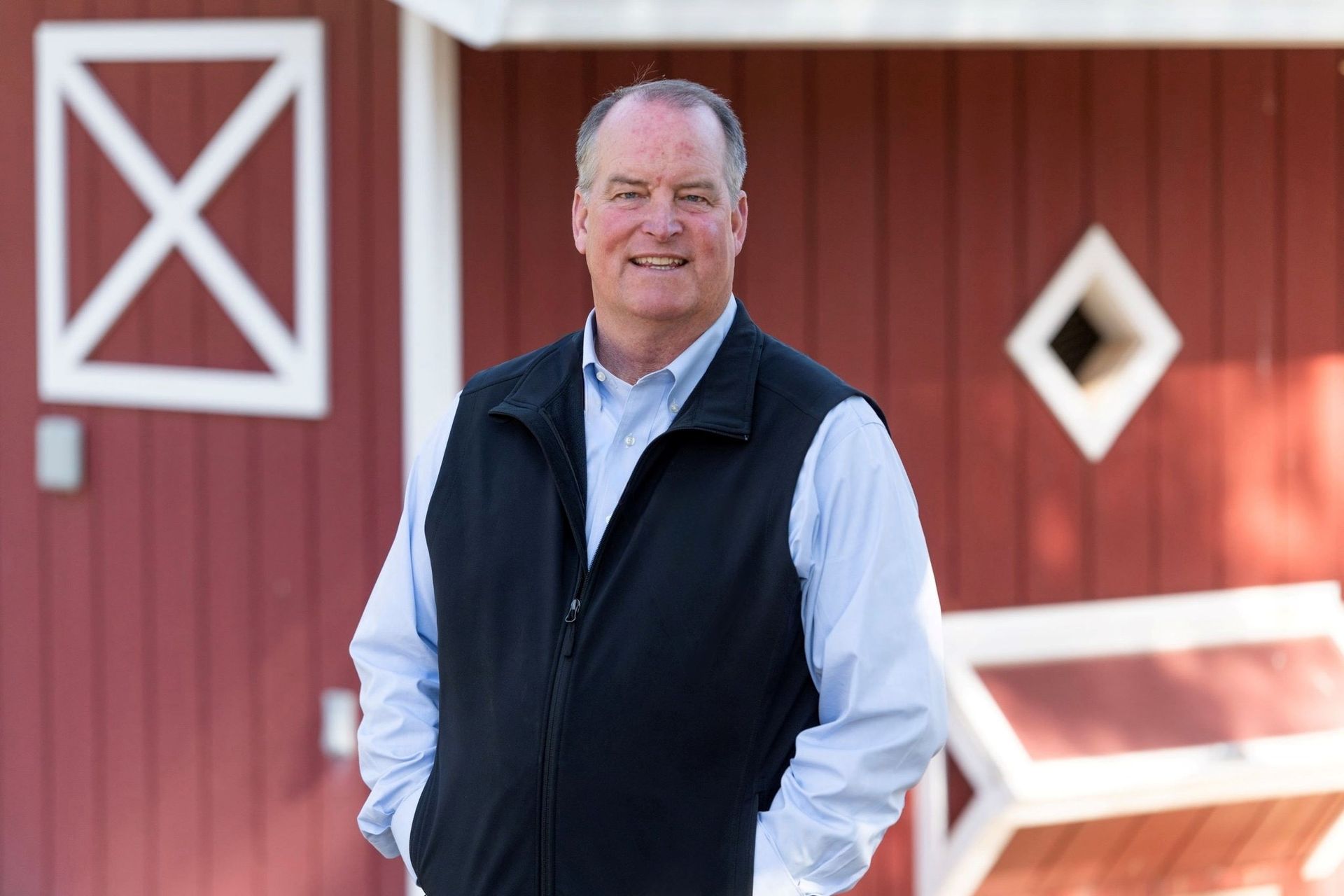 Jamie in front of his chicken coup at his farm in Oroville, CA.