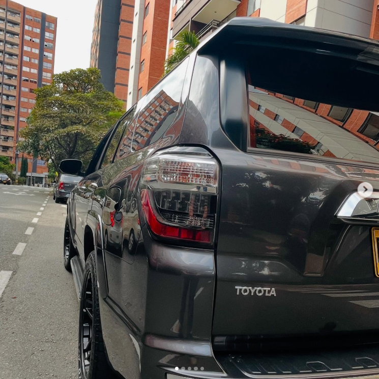 A toyota suv is parked on the side of the road