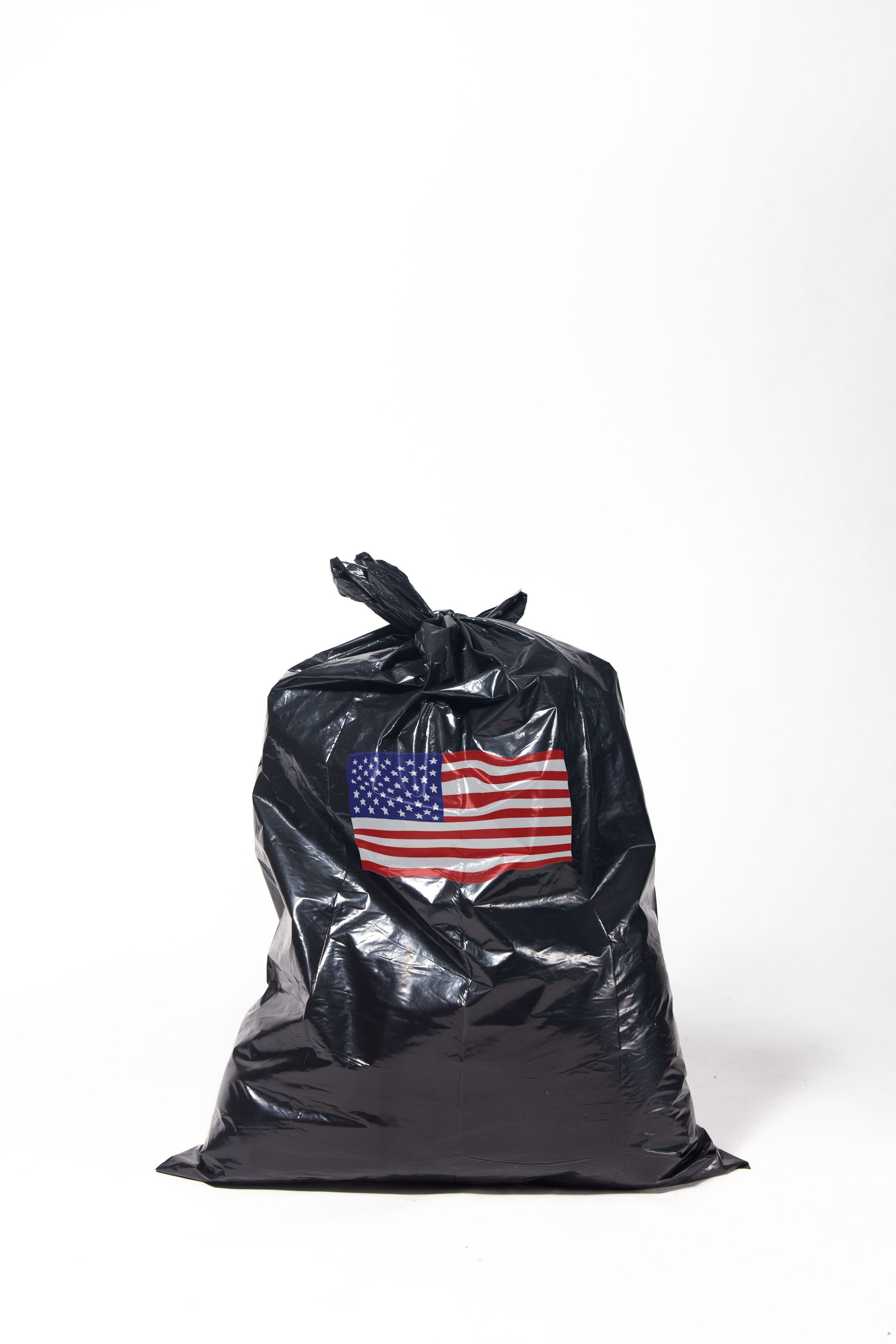 Black trash bag with American flag design; art by Matt Remsbecher. 