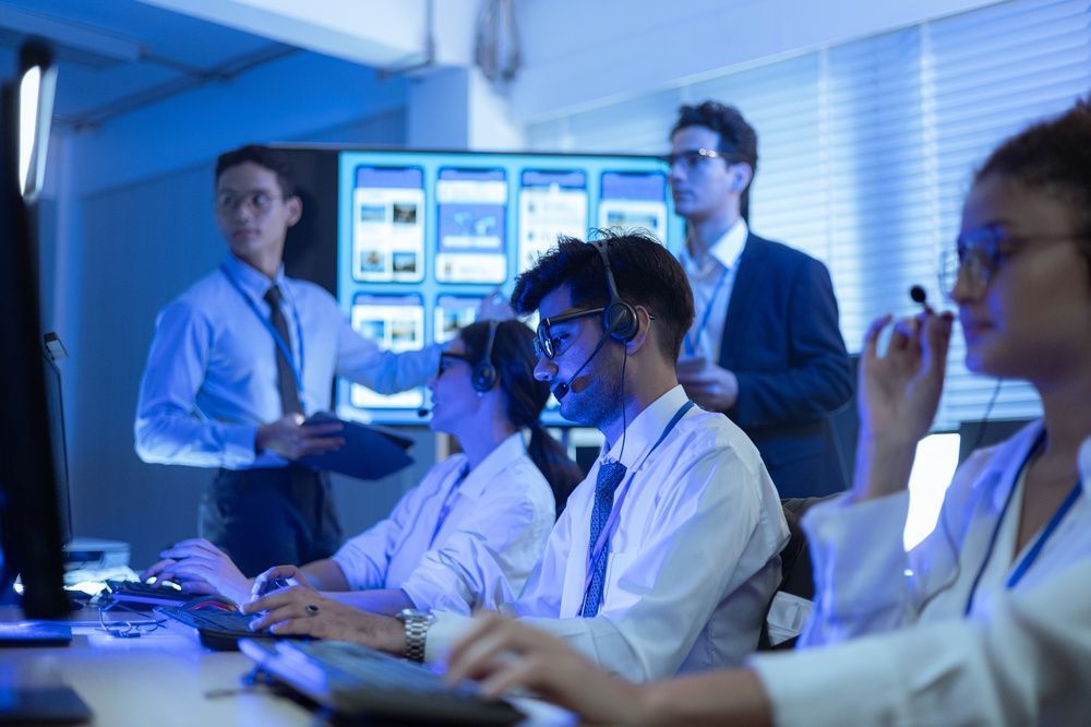 Researchers Working in a Blue-lit Lab — Compago Technologies In Cambridge, TAS