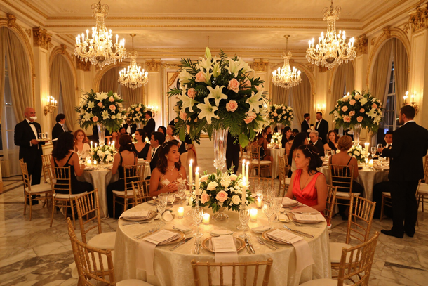 Grand ballroom reception with candlelight
