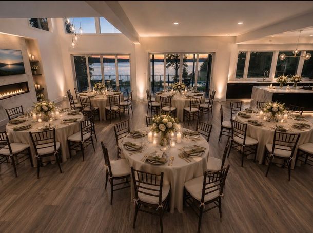 Glass-walled ballroom with water views