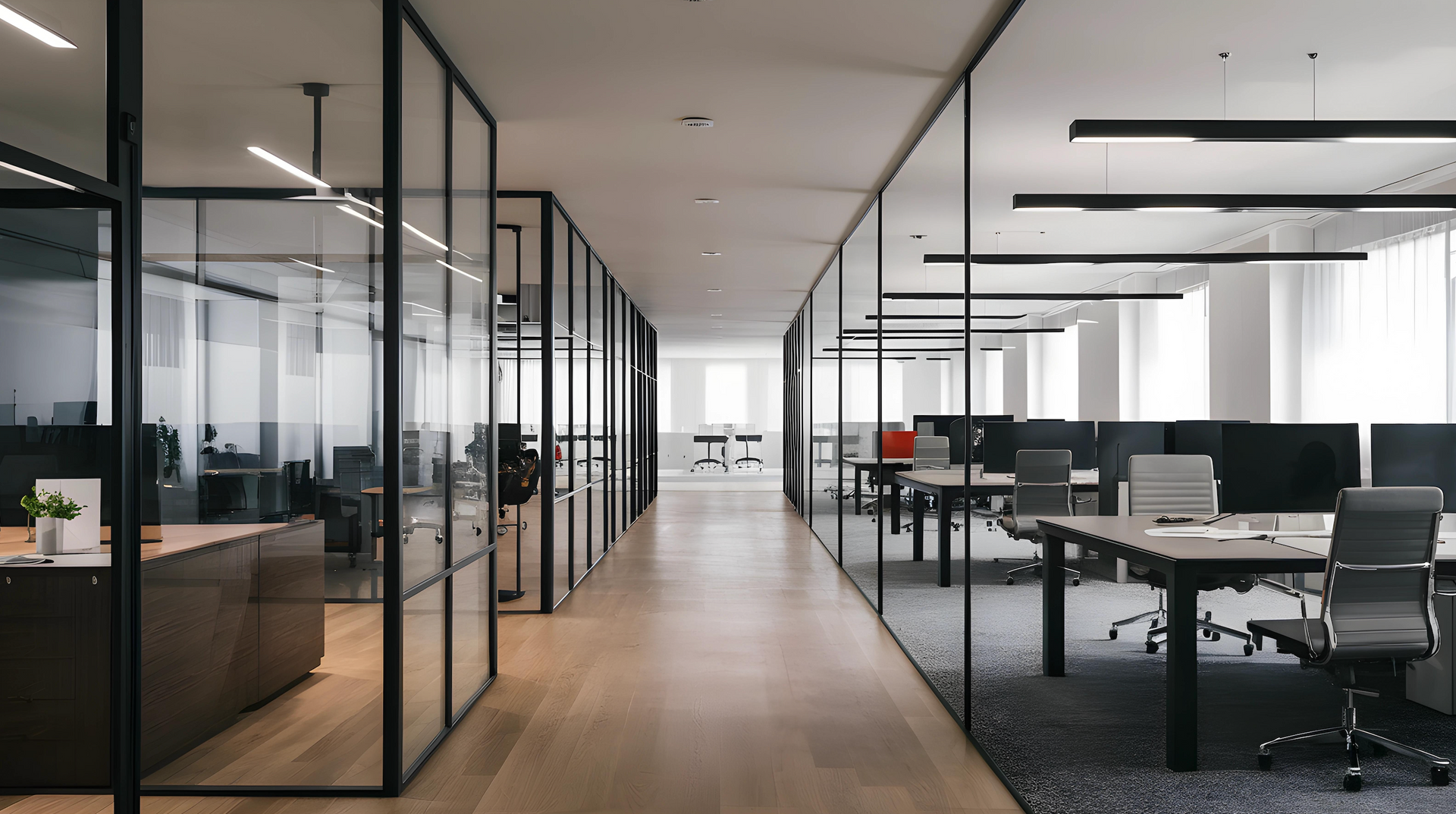 A long hallway in an office building with tables and chairs.