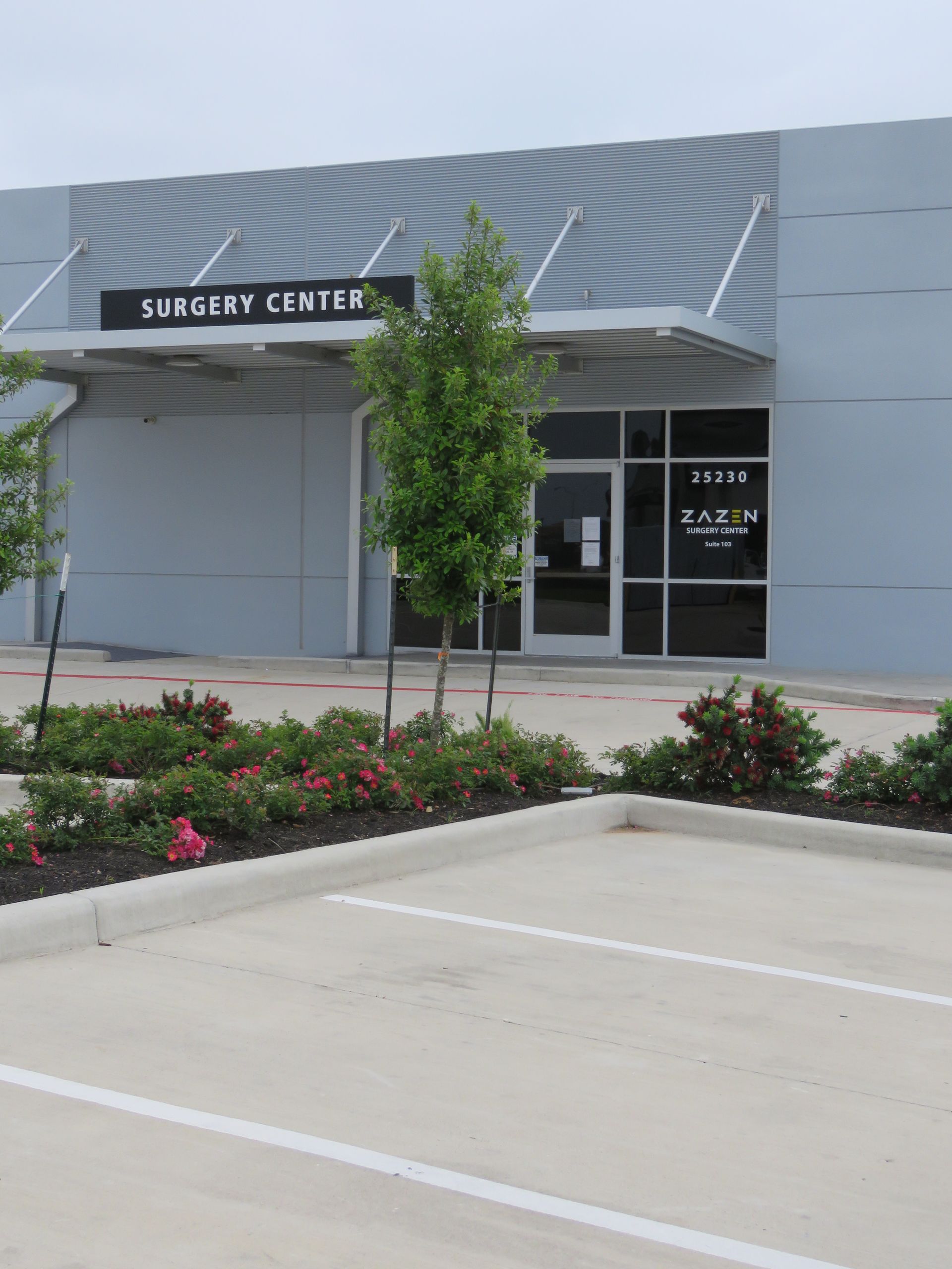 image of the facility's main glass door entrance with a decal that says