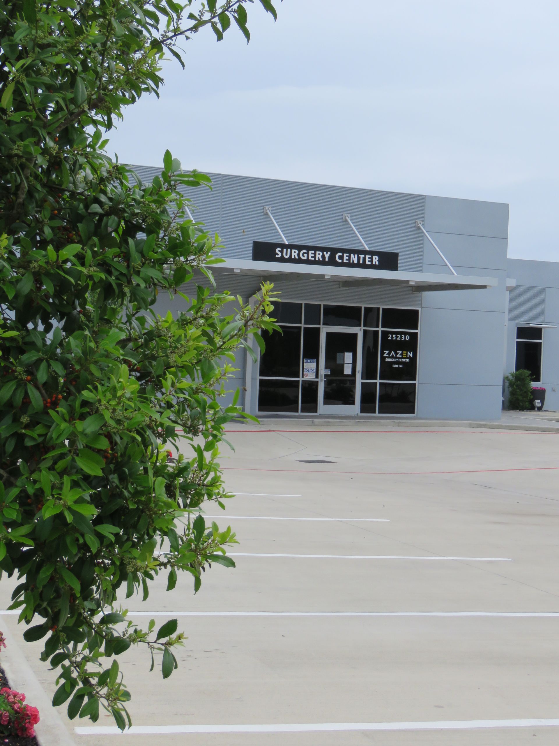 image of the facility's main glass door entrance with a decal that says