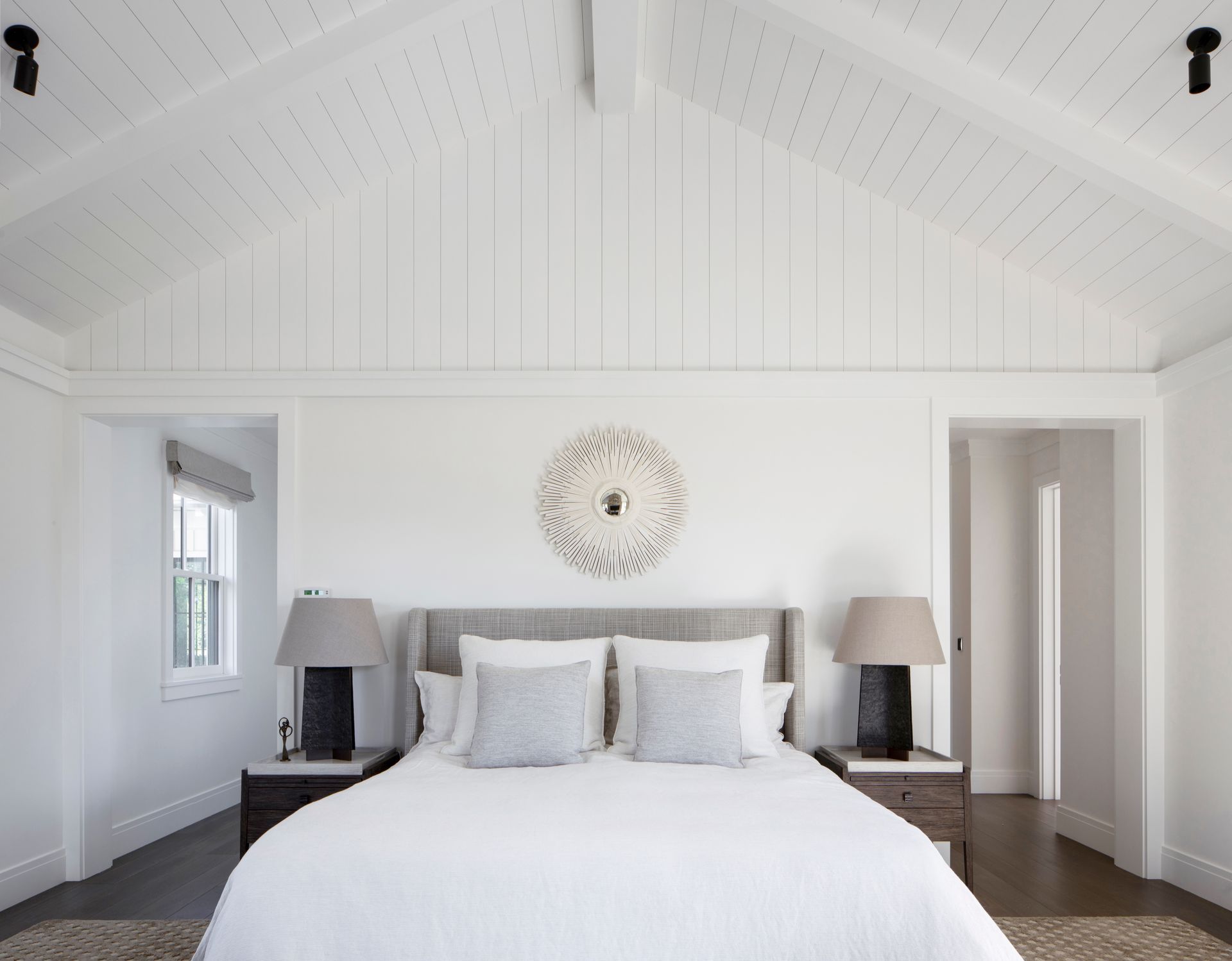 Bedroom with white walls and ceiling built by Nunley Custom Homes in Greenville, SC.