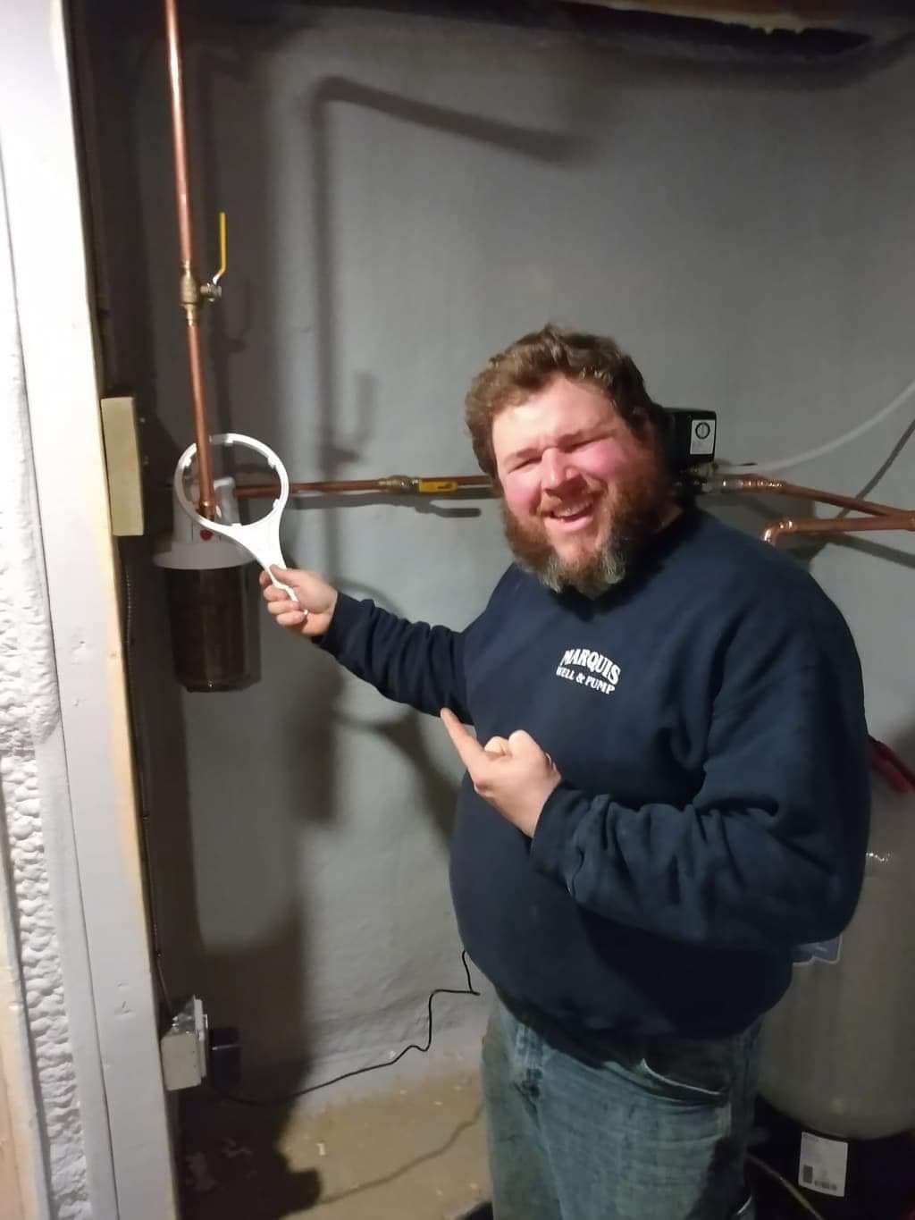 man checking pipes