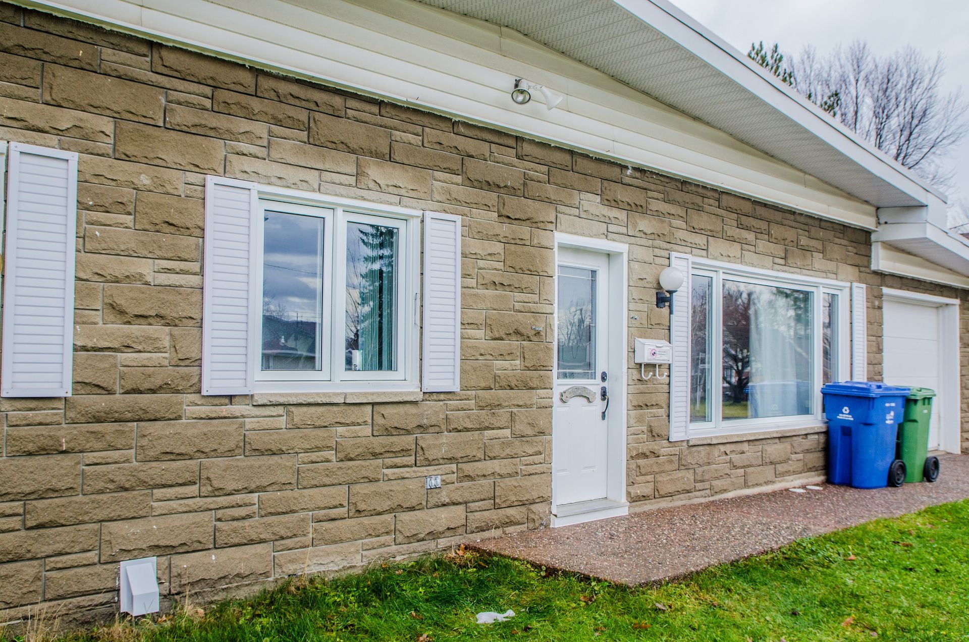 Stone Home Siding - Calgary, AB - KRAFT Exteriors & Developments Ltd.
