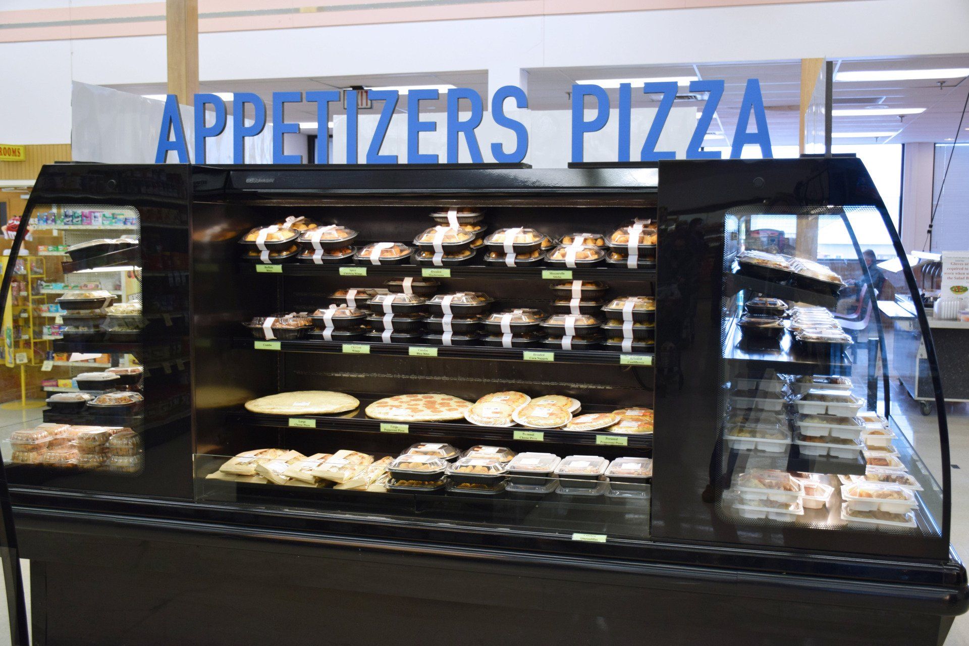 An appetizers pizza section of a grocery store