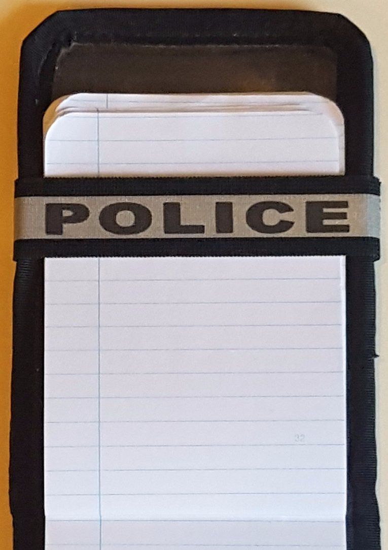 A Notebands™ for your Duty Notebook with the word police on it